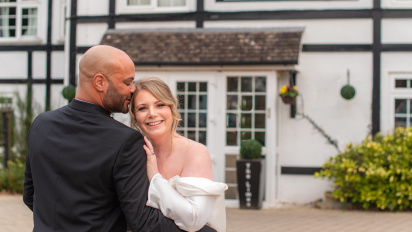 Newly married couple outside The Limes Country Lodge